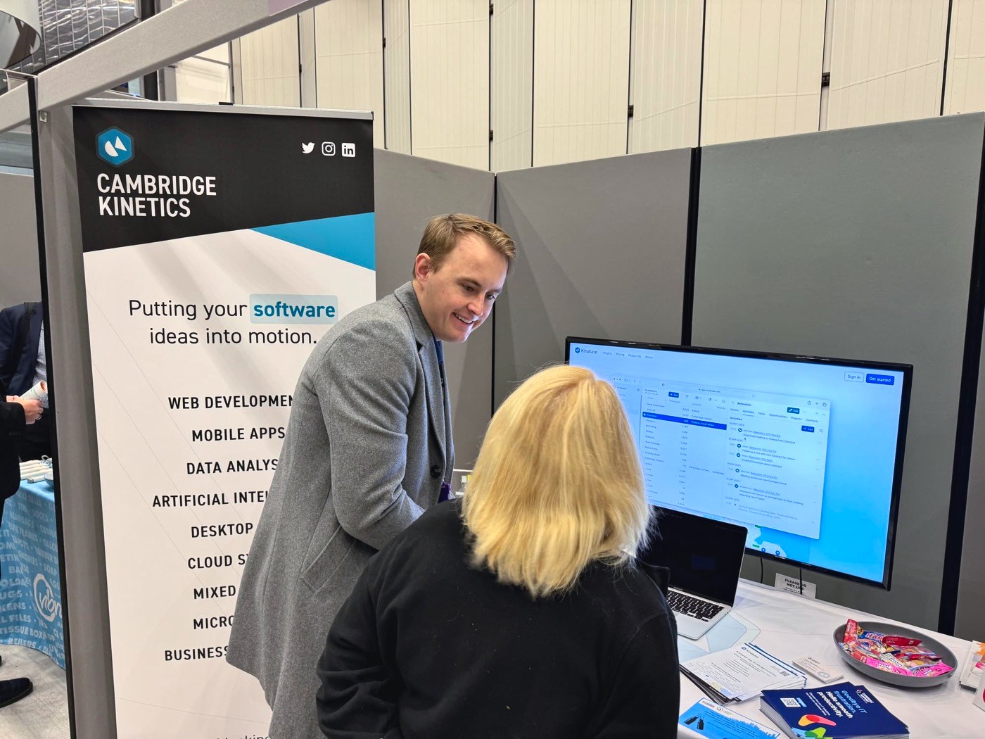 Nick explaining Kinabase to a visitor at our stand
