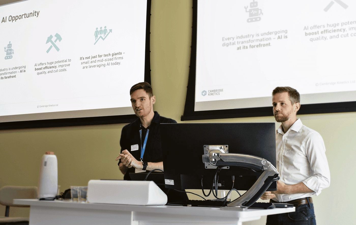 Two of our team giving a talk on AI at a Cambridge Network event